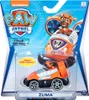 A toy vehicle, specifically a Paw Patrol True Metal vehicle featuring the character Zuma, is displayed in its retail packaging. Produktbild-Vorschau
