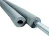 Two pieces of gray pipe insulation are shown side-by-side against a white background. One piece is shown with a metal pipe inside it, while the other is shown without a pipe, revealing its hollow interior. Produktbild-Vorschau