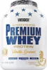 A white plastic tub of Weider Premium Whey protein powder with a Vanilla-Caramel flavor. Produktbild-Vorschau