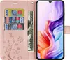 A pink flip-style phone case with card slots and a phone inside. Produktbild-Vorschau