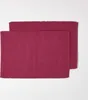 Two red placemats are arranged on a white background. Náhled obrázku produktu