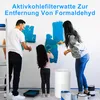 A family is painting a wall blue, with a white air purifier in the foreground. Produktbild-Vorschau