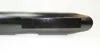 A close-up side view of a black, cylindrical object with two keyhole-shaped mounting brackets attached. Produktbild-Vorschau