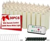 A product image showing a set of LED taper candles with a remote control and accessories. Náhled obrázku produktu