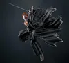 An action figure of Ichigo Kurosaki from Bleach in a dynamic pose, wearing his Hollow mask and signature black Shinigami uniform. Anteprima dell’immagine prodotto