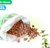 A bag of expanded clay pebbles spilling onto a white and light green background, with a mint plant on the right. Produktbild-Vorschau