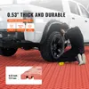 A person is working on a white truck with red interlocking garage floor tiles. Náhled obrázku produktu