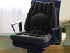 An inflatable seat cushion with lumbar support placed on a chair. Produktbild-Vorschau
