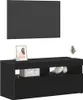 A black TV stand with a wall-mounted panel above it, against a white background. Náhled obrázku produktu