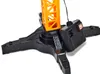 A close-up of the base and lower section of a toy crane, with a remote control attached. Náhľad obrázku produktu