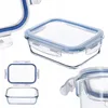 A collection of glass food storage containers with blue lids. Produktbild-Vorschau
