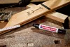 A woodworking scene with tools and materials. Produktbild-Vorschau