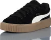 A studio shot of a single black Puma Creeper Phatty sneaker with a white stripe and a thick brown sole, set against a white background. Anteprima dell’immagine prodotto