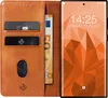A brown leather flip phone case is open, revealing card slots and a euro banknote. A smartphone is displayed on the right side of the image. Produktbild-Vorschau