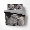 A duvet cover with a 3D print of kittens is shown on a bed. Produktbild-Vorschau
