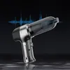 A silver and black handheld vacuum cleaner is shown against a dark background with a blue sound wave graphic overlay. Produktbild-Vorschau