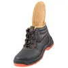 A black winter work boot with orange laces and sole, lined with brown fur. Produktbild-Vorschau