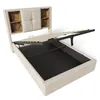 A bed frame with the mattress support mechanism lifted to reveal storage space underneath. Anteprima dell’immagine prodotto