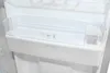 Close-up of an empty refrigerator drawer with a clear plastic lid and compartments. Produktbild-Vorschau
