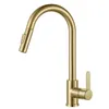 A gold kitchen faucet with a pull-out spray head is shown against a white background. Produktbild-Vorschau