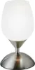 A close-up studio shot of a modern table lamp with a frosted glass shade and a brushed metal base. Produktbild-Vorschau