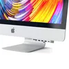 A close-up of the bottom front of an Apple iMac computer, showing a USB-C hub attached to the front. Produktbild-Vorschau