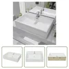 A collage of images showing a white ceramic sink from different angles, including a lifestyle shot in a bathroom. Produktbild-Vorschau