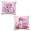 Two square pillows with cartoon characters on them, set against a light purple background with decorative elements. Produktbild-Vorschau