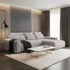 A modern living room with a sectional sofa, coffee table, and curtains. Produktbild-Vorschau