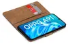 A brown flip case for a smartphone, with two cards inserted into a slot inside the case. The smartphone screen displays the 'OPPO A91' logo. Produktbild-Vorschau
