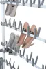 A close-up view of a multi-tiered shoe rack holding various shoes. Produktbild-Vorschau