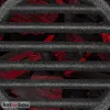 A close-up view of a grill grate over glowing red coals. Anteprima dell’immagine prodotto