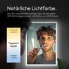 A man brushing his teeth in front of a lighted mirror, with a color temperature scale displayed on the left. Produktbild-Vorschau