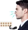 A man wearing a suit is shown with a nasal strip applied to his nose, with blue arrows indicating airflow. Below him are a sheet of circular patches and a black nasal dilator. Náhľad obrázku produktu