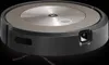 A robotic vacuum cleaner is shown from a slightly elevated side angle against a black background. Náhled obrázku produktu
