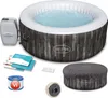 A Lay-Z-Spa Bahamas AirJet whirlpool with its accessories laid out around it. Produktbild-Vorschau
