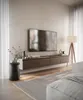 A modern living room with a wall-mounted TV stand and television. Produktbild-Vorschau
