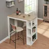 A bar table with stools in a room with a window and a cabinet. Náhled obrázku produktu