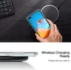 A hand holding a transparent phone case over a wireless charger, with a keyboard in the background. A second image shows the phone case on the charger. Produktbild-Vorschau