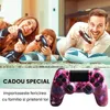 A family playing video games together on the floor, with a gaming controller in the foreground. Produktbild-Vorschau