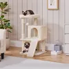 Two Siamese cats are relaxing on a beige cat tree in a living room setting. Produktbild-Vorschau