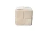 A beige cord pouf on a white background. Produktbild-Vorschau