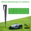 A robotic lawnmower on grass with a ground stake and text about ordering quantities. Produktbild-Vorschau