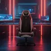 A gaming chair in a dimly lit room with neon lights. Anteprima dell’immagine prodotto