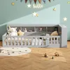 A child's bedroom with a grey bed frame, toys, and decorations on the wall. Produktbild-Vorschau