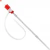 A manual siphon pump with a red handle and a white hose, isolated on a white background. Anteprima dell’immagine prodotto