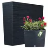 Two dark grey planters with a textured finish, one tall and one shorter with pink flowers and green foliage. Produktbild-Vorschau