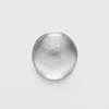 A single drop of clear liquid with small bubbles inside, placed on a white surface. Podgląd zdjęcia produktu