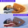 A woman sleeping on a pillow, with two different lighting conditions and text overlays indicating seasonal use. Produktbild-Vorschau