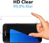 A hand is holding a screen protector over a smartphone. Produktbild-Vorschau